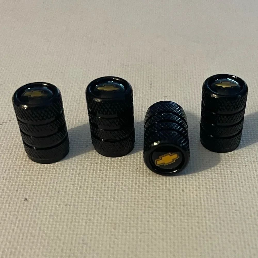 Chevroletย valve Stem caps in blackโset of 4 with LogoโNWT